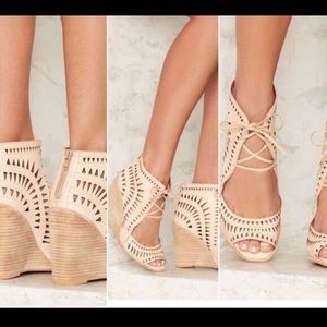 Jeffery Campbell laser cut tan wedges. SIZE: 6.5